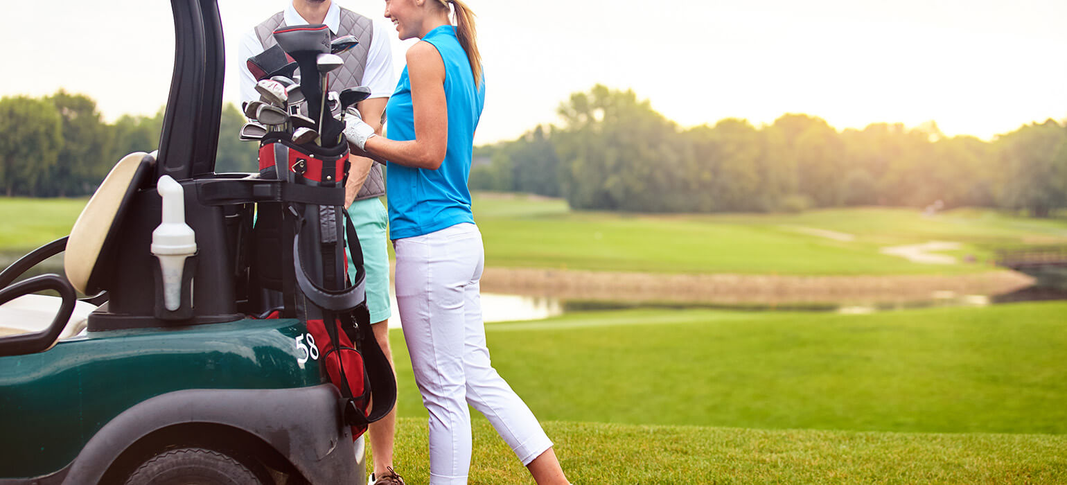 golfer with clubs